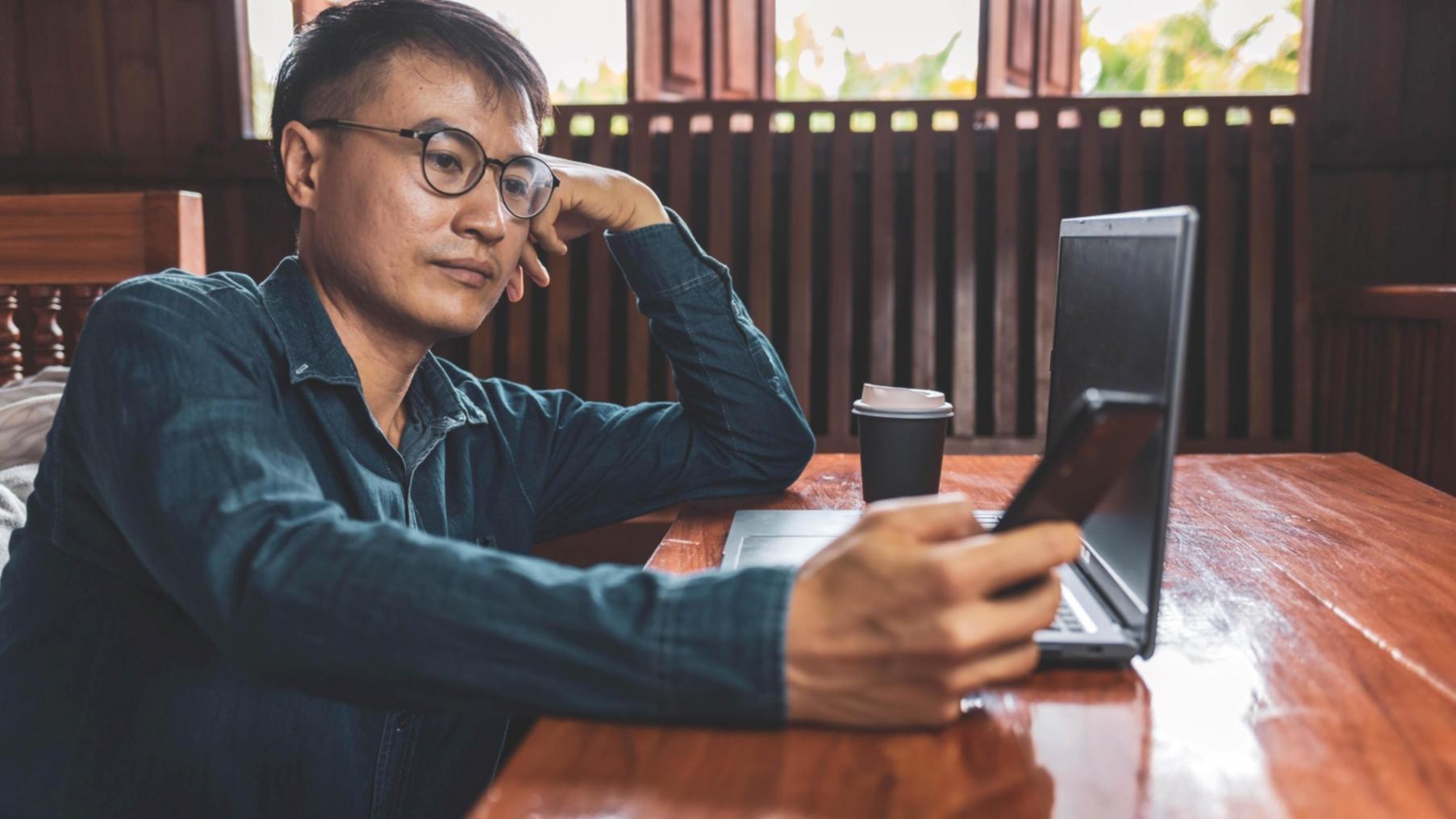 Web application security professional working at a workstation